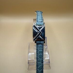 Opening Envelope Bracelet On Light Blue-Gray w/ a Glossy Crocodile Embossed Band